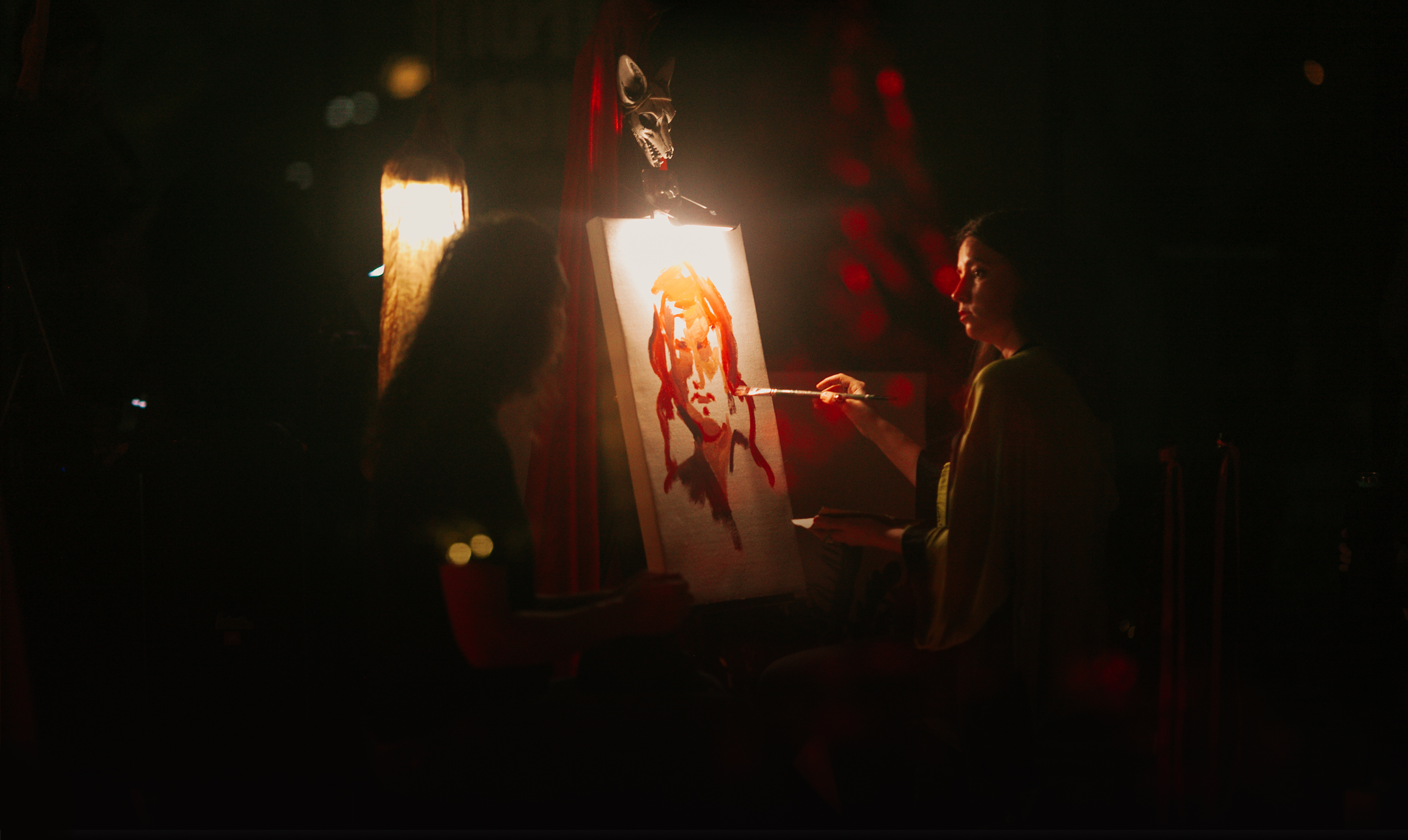 Mari Strange painting a Wild Portrait during an Art Ritual